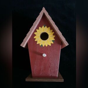 Hand painted Birdhouse. Brand new. Wooden with red finish and yellow sunflowers.